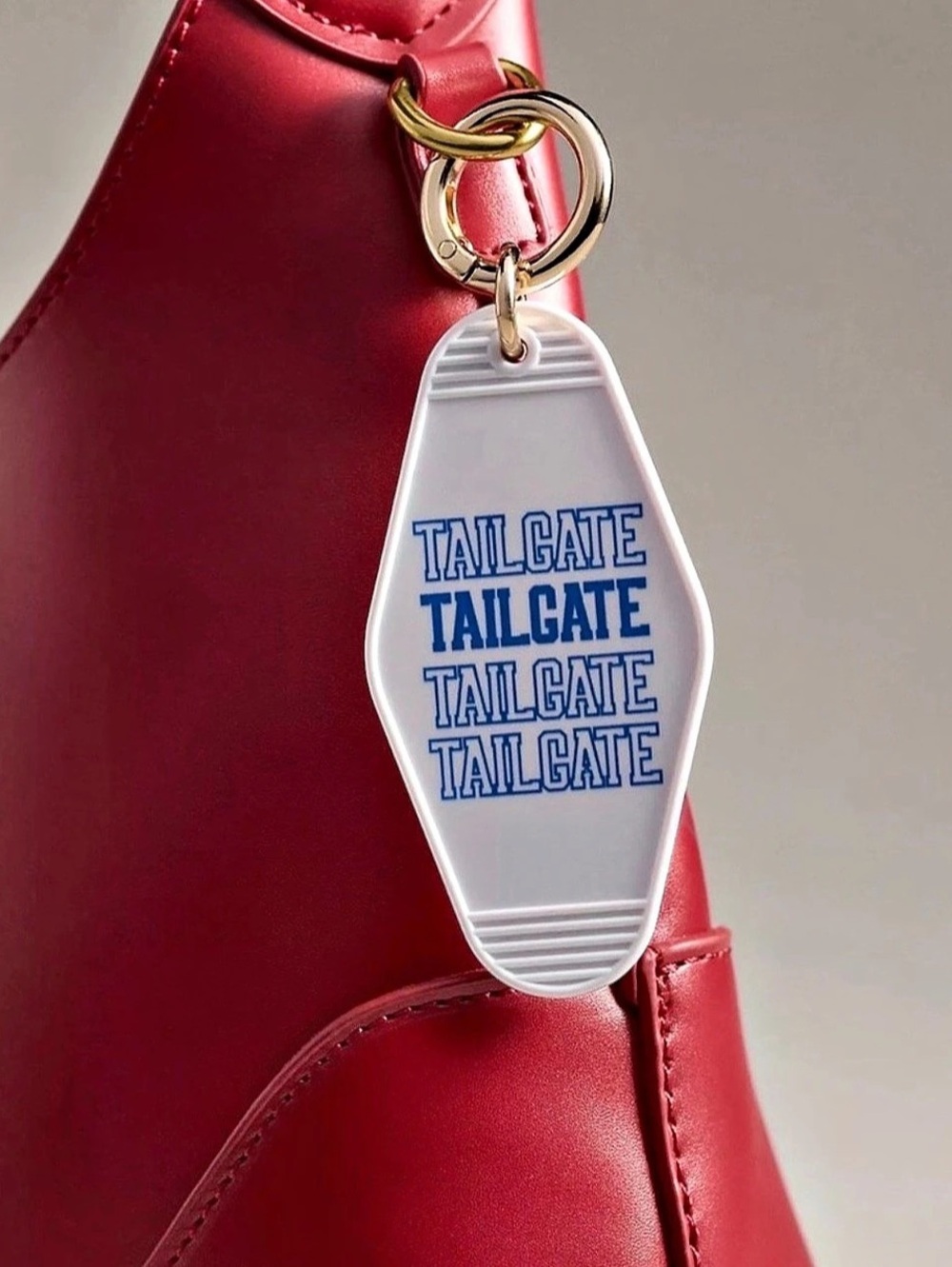 Anthropologie Bag Charm “Tailgate”